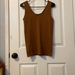 Light brown body hugger shirt